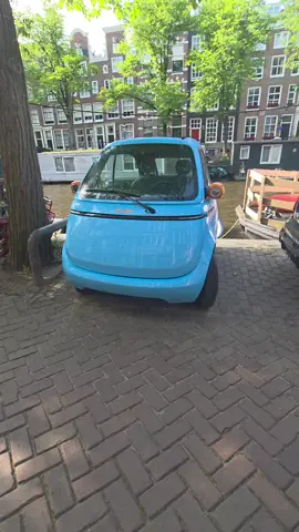 Only in Amsterdam will you see a car so tiny it looks like it came with a Happy Meal 🍟🚗 Fits anywhere, turns heads everywhere like… is it street legal or just here for vibes? 😅 Honestly, I need one of these for errands and dramatic exits. #TinyCarGoals #AmsterdamLife #TooCuteToDrive #MiniWhipMagic #411onthego