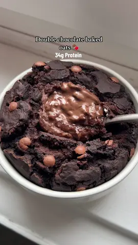 Nothing like eating a decadent cake for breakfast that also fuels and nourishes you 😎 and if that isn’t what we all want in life then idk what is. I also also ALWAYS have a bowl of fruit on the side to make this a more balanced meal :) 50g of oat flour* (or oats blended to flour)  5g of cocoa powder* 25g of a chocolate vegan protein powder* 1/2 tsp of baking powder  140-150mls of liquid (I just use water)  1 square of dark chocolate (I used @hukitchen ) Topped with: Dark choc chips All things marked with a star are from @Prozis_official (code FITFOODIEJULES for a discount + gifts ✨✨)  Combine all ingredients together (except chocolate) then pour the batter into an oven safe dish/ramekin Add the square of dark chocolate to the centre, and cover with batter. Top with choc chips then bake for 20-25 minutes at 180°!  #bakedoats #proteinoats #oattok #healthybreakfast #oatrecipe #proteinbreakfast 
