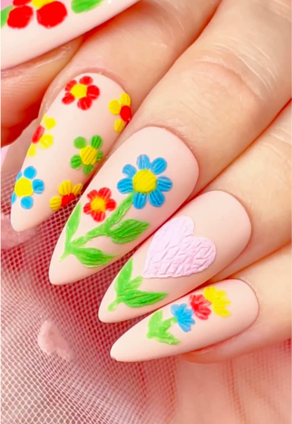 Okay but… how cute are these crochet flower nails?! 🧶🌸 The tutorial is HERE so you can stitch together your own perfect set 💕 📣 Sound off in the comments with what you wanna see her try next 💬👇 We’re feelin’ inspired and ready to create 🌼💭 #TickledPinque #FloralNails #CrochetNails #FloralNailArt #NailArt #NailTech #GelNails #AcrylicNails #NailTutorial #prettyinpinque
