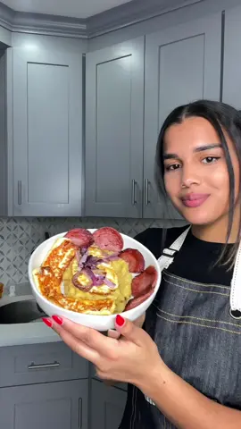 Mangu con los tres golpes y morir soñando 🇩🇴 A Dominican favorite ❤️ If you’re not Dominican and have never tried this dish, I recommend for you to try it! It’s so delicious, filling and easy to make with the instructions below:  Ingredients for the Mangu  - green plantains  - Salami  - Cheese (make sure it’s cheese for frying)  - Eggs  - Purple onion - Oil  - Butter  - Salt  peel and boil the green plantains in water with some salt for 15-20 minutes. To mash the plantains you’ll need some butter, a little bit of the water you boiled it with and a splash cold water.  Los tres golpes are salami, eggs, and cheese. You could fry all of these in a pan with some oil or you can use the air fryer to fry the salami and cheese. I’ve tried this method before and they come out really nice and crispy.  Ingredients for the morir soñando: - lime (you can also add orange juice) - sugar  - evaporated milk  - vainilla  - ice  First squeeze the limes and add some sugar before adding a lot of ice. You have to make sure the lime juice is very cold before adding the evaporated milk, if not the mixture will curdle and go bad. When pouring the milk, make sure you’re stirring continuously until both the milk and the juice are fully incorporated. You’ll notice how the mix feels heavier and creamier. I like adding a splash of vanilla, but that’s optional.  [ Dominican recipe, Dominican meal, morir soñando, mangu recipe, Dominican food, Dominican cook, easy recipe, Caribbean recipe, Dominican drink, jugo dominicano, receta dominicana ] #dominicanfood #dominicanrepublic🇩🇴 #mangu #morirsoñando #comidadominicana #dominicanrecipe #EasyRecipe 