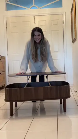obsessed with this fluted walnut coffee table & the fact that I didn’t have to put it together 😍  The second I saw someone unbox this table I knew I needed it and it was 10000% worth it. The fluted texture & color make it look super modern & elegant and the lift top is so convenient for eating meals of working from the couch. You can grab this coffee table in two styles and three colors but they are selling out fast.  Click the orange cart above my name to order yours before the flash sale ends! 🤎  #furniture #tiktokshopfurniture #coffeetable #coffeetablestyling #coffeetabledecor #livingroomfurniture #livingroominspo #table #homeinspo #homedecor #tiktokshopcreatorpicks #dealsforyoudays  #creatorsearchinsights 