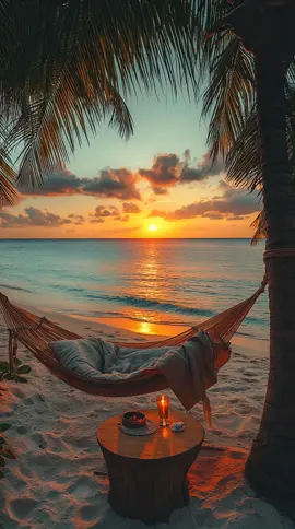 Golden hour, a cozy hammock, and the sound of waves... 🌅✨ This is your sign to unplug and escape to paradise. #BeachVibes #SunsetGoals #TropicalEscape #HammockLife #OceanVibes