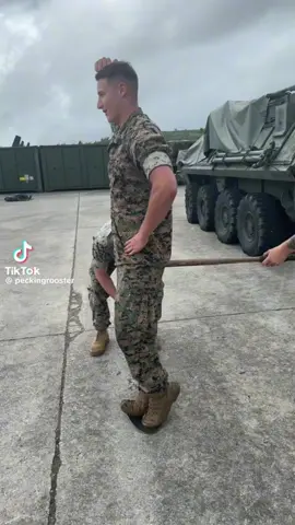 I love this military video their pretending to turn the key to make him spin around  like he is a military doll figure that turns if you put the key in it #creatorssearchinsight #military #uniform  #fypシ゚viral 