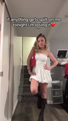 wearing a white dress to a night out is always a risk but the outfit was too good to play it safe. black boots, red bag, and a little anxiety #nightoutfit #summerstyle #cutefits #styletok #ootn #goingoutoutfit #whiteoutfit #trendythings #fashiontiktok #outfitinspo
