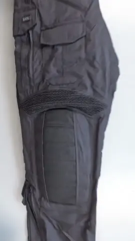 UATAC Gen 5.6 Combat Pants with kneepads | Black  DESCRIPTION The UATAC Gen 5.6 Combat Pants with Knee Pads are designed specifically for active duty military personnel. The main emphasis in the development of assault pants with knee pads was placed on durability and comfort. The pants have been repeatedly updated and improved based on the experience of military use in extremely difficult conditions. The fabric consists of 65% cotton and 35% polyester, which makes it pleasant to the touch and resistant to tearing and damage. Ripstop weaving and German reinforced threads will prevent the pants from tearing even under heavy loads. Moisture-repellent Teflon coating protects against water and increases resistance to dirt. Equipped with two ventilation zones for improved thermoregulation. Insertable knee pads (included) are adjustable. Knee pads of the new generation are more convenient to use. Externally protected by reinforced CORDURA® 500d Brookwood® USA fabric. For convenient use, the pants are equipped with 11 pockets - two pockets in the front and two pockets in the back, 2 large cargo pockets (Left - equipped with two stabilizing elastics for fixing a water bottle or magazine and a carabiner; Right - equipped with two mesh compartments), two front pockets with adjustments the height of the knee pad inside, two pockets for small things in the lower part, a pocket for a knife on the right side. Fabric 65% cotton, 35% polyester. Ripstop weaving. Moisture repellent Teflon coating. Ventilation holes in the groin area and in the lower part of the pants. 2 carabiners on the front of the pants and in the left cargo pocket Insertable knee pads (included). If necessary, you can get knee pads. Externally protected by reinforced CORDURA® 500d Brookwood® USA fabric. Practical kneepad height adjuster and velcro tightening for correct positioning of the kneepad. Increased stretch panels with a stretch factor of 1.5 for better comfort during active use Two large cargo pockets on the hips Side zip cargo pockets for easy access while seated YKK zippers Two-layer seating area Care instructions for the trousers: Wash in cold or warm water up to 40°C on a gentle cycle. If possible, use detergents without aggressive components and color enhancers. To prevent color loss, do not dry the product at high temperatures 