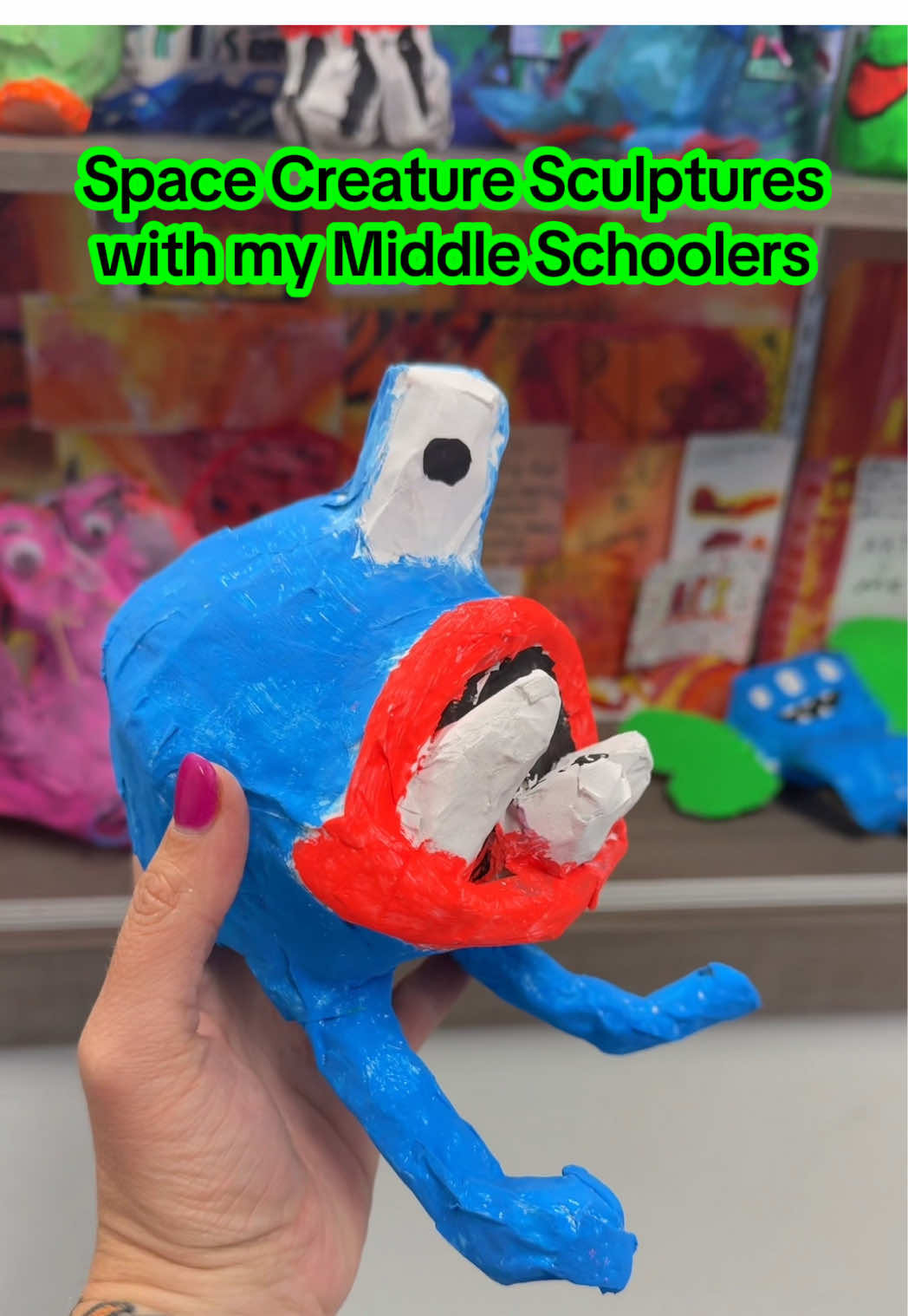 Middle school students were tasked with creating space creatures between 6 in. - 12 in. (Otherwise they would be HUGE….I’ve learned my lesson). They created the base with newspaper, masking tape, wire, and cardboard. They covered everything with papier-mâché and then painted everything with neon paint. These were displayed in our glow room at the art show and they looked amazing!  * * * #GlowRoom #GlowShow #GlowGallery #GlowArt #SpaceCreature #Sculpture #MiddleSchoolArt #SculptureArtProject #MiddleSchoolSculpture #PaperMache  
