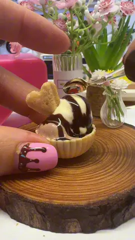 What sauce is on your ice cream? I’m having a Neapolitan with chocolate sauce and a wafer. Who is having hot weather? Heat wave here in the UK it's cold drinks or cold treats here in the mini bakes kitchen! #icecream #heatwave #chocolate