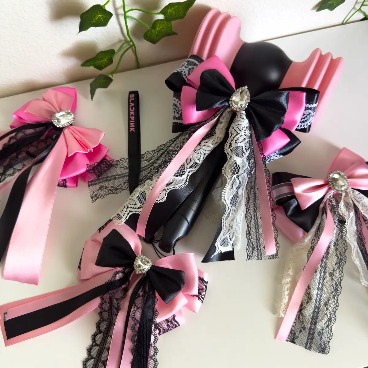 Selling lightstick bows and other keychains and charms for Blackpink tour this weekend in LA at SoFi so keep an eye out!(: