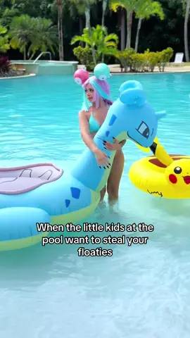SHOO SHOO GET YOUR OWNNN #pokemon #lapras #pikachu #iono #ionocosplay #pokemoncosplay #pool #Summer #puertorico 