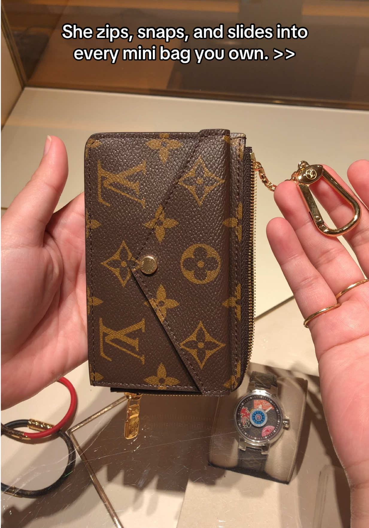Crafted in iconic Monogram canvas and trimmed in smooth cowhide leather, the LV Recto Verso is zipped, snapped, and slotted for movement. She fits in your palm but carries coins, cards, and quiet confidence with precision. No bulk, no noise—just a layout that performs without asking for attention.  Finished with gold-tone hardware and a chain hook, she’s the kind of piece that slips into your life and stays. 🤎    💬 Secure this stunning piece today with our hassle-free layaway plans—up to 6 months to pay!💫   📲 Ready to shop? Send us a DM, Viber, or WhatsApp at 0921-773-0042 for a seamless shopping experience!