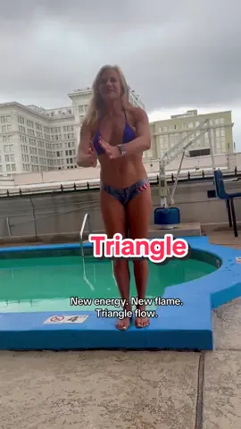 Quick triangle on the rooftop in my blue bikini top — right after the rain cleared 🌧️💙 The air felt clean, the sky soft… and the energy? Something new. Flowing to New Flame, because it just fit the moment. #TrianglePose #BikiniYoga #RooftopFlow #AfterTheRain #NewFlameVibes #BlueBikiniTop #QuickStretch