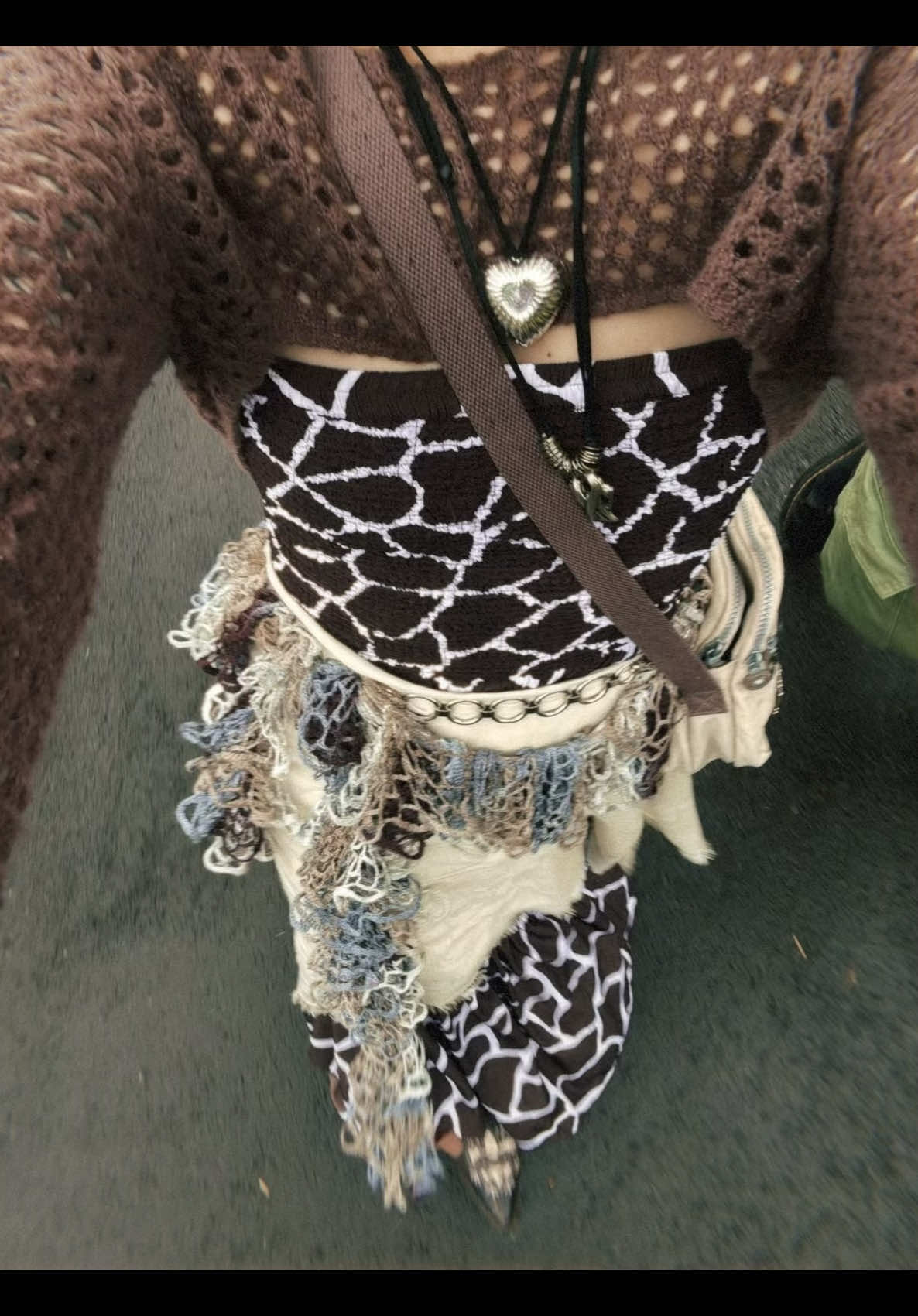 SIDEBAR: I want to be transparent about my stance on zoos and animal enclosures. I do not support facilities that exist primarily for entertainment or profit—those that exploit animals for commercial gain with little regard for their welfare. I believe that animals deserve to live freely in their natural environments, not behind glass or bars for human amusement. That said, today I visited my local rainforest zoo, which operates as a non-profit organization. Its mission is focused on education and conservation, not entertainment. Majority of the animals housed there are injured, endangered, or otherwise unable to survive in the wild.  I will acknowledge that there are a few species—such as snakes, alligators, and tigers—that are not native to Hawai’i, and I do have some reservations about them being here. However, given that the organization is not exploiting these animals for profit and instead uses them to educate the public and re-home, I believe the overall impact and intent is a positive one, reservations or not. I chose to visit in order to learn more about my native wildlife and support a facility that seems committed to ethical care and public awareness. It's not a perfect situation, but it's important to engage critically and support places that are trying to do the right thing. #grwm #fashion #zoo #animalprint #coach #cowboyboots #fyp #layers 