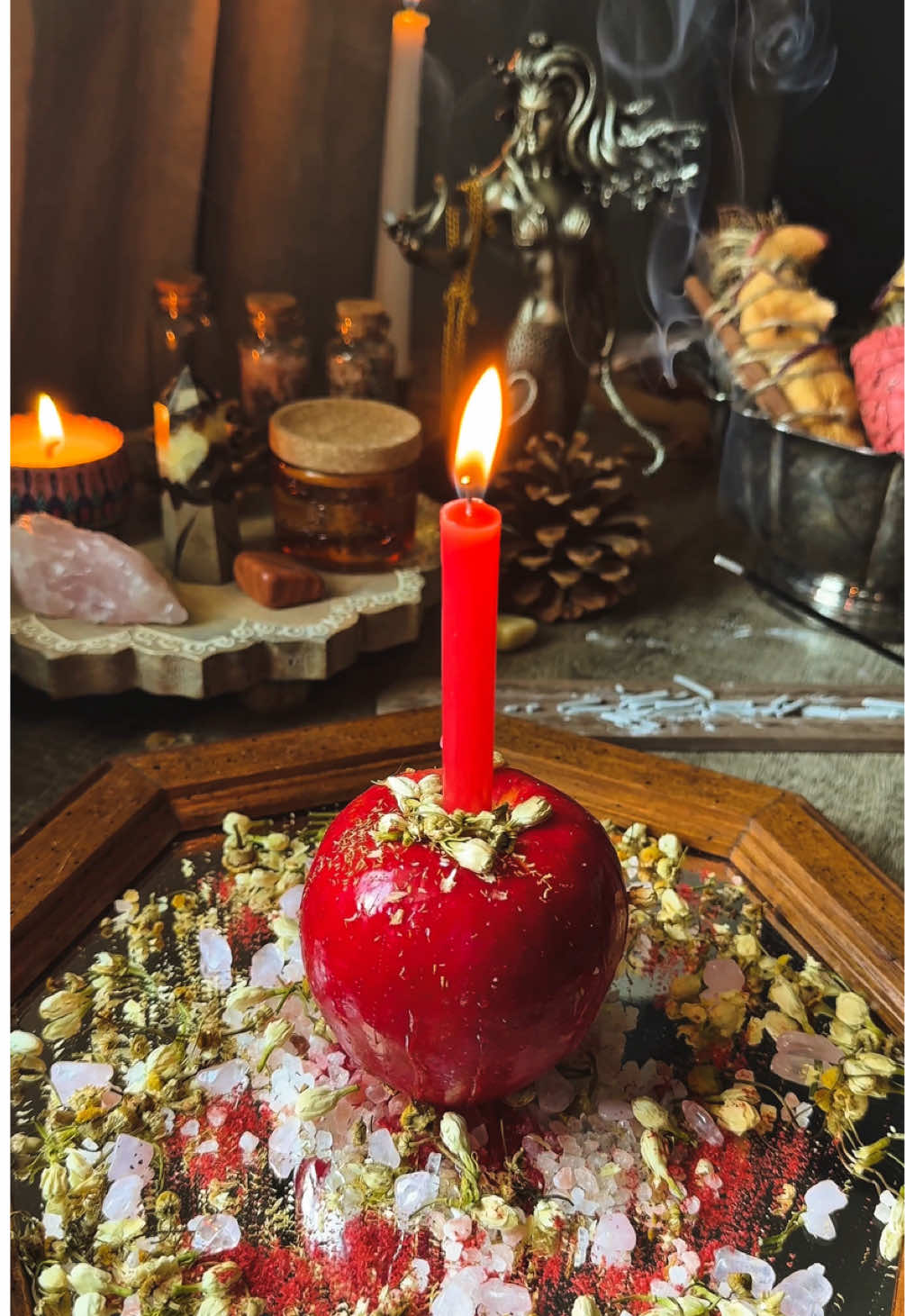 💕🎀 Beauty Spell 🎀💕 🪞 Mirror magic is the use of mirrors in spellwork and rituals to amplify intention, reflect energy, or act as a portal between realms. Great for beauty spells. 🔮 Materials: - Salt: Absorb negative energy - Apple: Apples are ruled by Venus, making them ideal for glamour, attraction, and self-love magic. - Red candle: channels energy from the root of confidence, passion, attraction, and raw magnetic beauty. - Pen and paper - Ylang ylang oil: Love, sensuality, beauty, calm, and self worth - Honey: Sweetening, binding, healing, and attraction properties. - Jasmin: Love, sensuality, intuition, dreams, and beauty - Chamomile: Peace, abundance, beauty,  and emotional healing - (Optional) Mirror - (Optional) Rose Quartz: Self-love, beauty, emotional healing,and charm - (Optional) Dragons Blood: Enhances the spell ⭐️ Empress tarot card is perfect for beauty spells — she embodies divine femininity, sensuality, abundance, and radiant self-love. Cleanse your area and mirror. Place the Empress tarot card so that the spell soaks the energy of the cards. Place your mirror on your alter. Lay some salt down on the mirror for protection. Safely cut a hole into your apple for the candle to be placed in. Write your name on a piece of paper and fold toward you so the beauty energy is absorbed by you. Place the red candle into the apple. Add the honey, oils and herbs to your spell. Have fun with it and see what herbs you connect to. Lit your candle while thinking of your intentions of this beauty spell. While the candle is burning, soak in the heat of candle while letting the beauty spell in. After the spell is done, bury back into the earth with thanks. Or can be thrown away with a thank you.  #mirrormagic #beauty #beautyspell #attraction #bruja #witchtok #witchesoftiktok #fypage #💖 #viralvideo #witchyvibes 