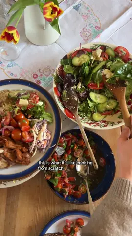 Homemade Houmous + Pickled Onion recipes 👇🏻 This is what cooking for the masses looks like in a from scratch kitchen 😅 If you're cooking for friends and you're wanting to make everything from scratch- my biggest piece of advice is to keep it simple!! Don't whip out a recipe you've never tried before- lean on the things you know how to make, make them to a good standard, and your guests will be chuffed. Bob's Quick Houmous 🧄  2× 400g tins chickpeas (or alternatively if you're using dried chickpeas, 800g once they've been soaked and cooked) 150g tahini 2 tsp ground cumin 100ml extra virgin olive oil Juice of 4 lemons 1 tsp flaky sea salt 1 garlic clove or 30ml garlic infused olive oil Add all of your ingredients to a food processor and blend. As it comes together, it'll start to become quite dry, so standby whilst it's blending, gradually adding water until it's just soft enough to blend. Keep on blending until it's completely smooth, then add to jars or containers and keep in the fridge. Pickled Red Onions 🧅  8 red onions 500mL white vinegar 500mL water 60g white sugar 2 Tbsp salt Slice your onions as thinly as possible- I like to use a mandolin or the slicing attachment on my food processor for this. Add your onions to a large glass jar or a few smaller jars, and try and pack as many onions into each jar as you can, pushing them down until they're compact. Next, add your vinegar, water, sugar and salt to a saucepan, and bring to a simmer, until all of the sugar is dissolved. Allow to cool for a few minutes, then pour your hot vinegar mixture over the onions, filling each jar to the top. After a few hours, the onions should be pink and ready to eat, but they'll keep in the fridge for weeks! #cookingfromscratch #fromscratchcooking #wholesomefood #dinnerrecipes #dinnerparty #dinnerpartyideas #homecooking 