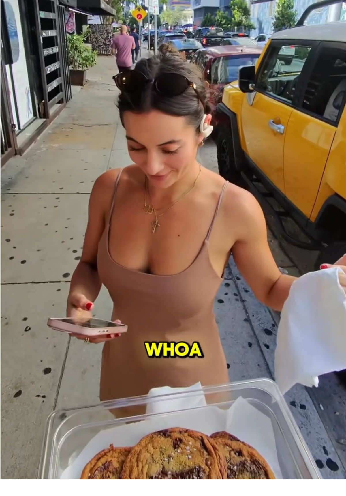 Once she saw the cookie she had to pull out the camera #sundress #chocolatechipcookies #stream