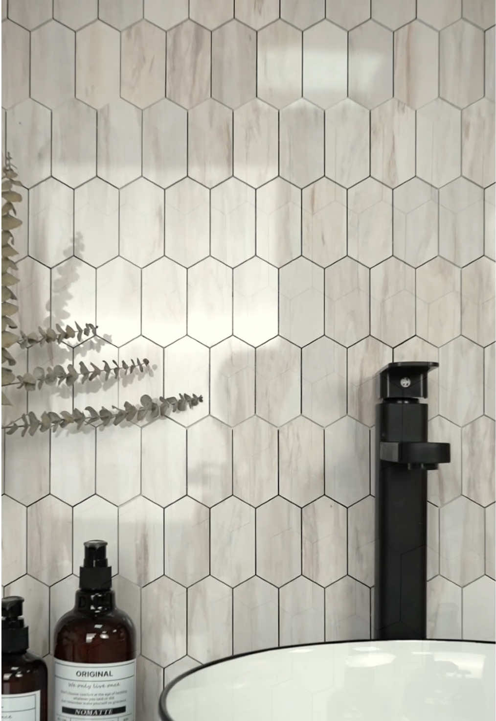 Updating my bathroom with peel and stick tiles. #stickgoo #tiktokdealsforyoudays #peelandsticktile #peelandstickbacksplash #backsplash #easydiy #bathroommakeover #walldecor #beforeandafter #smallspace 