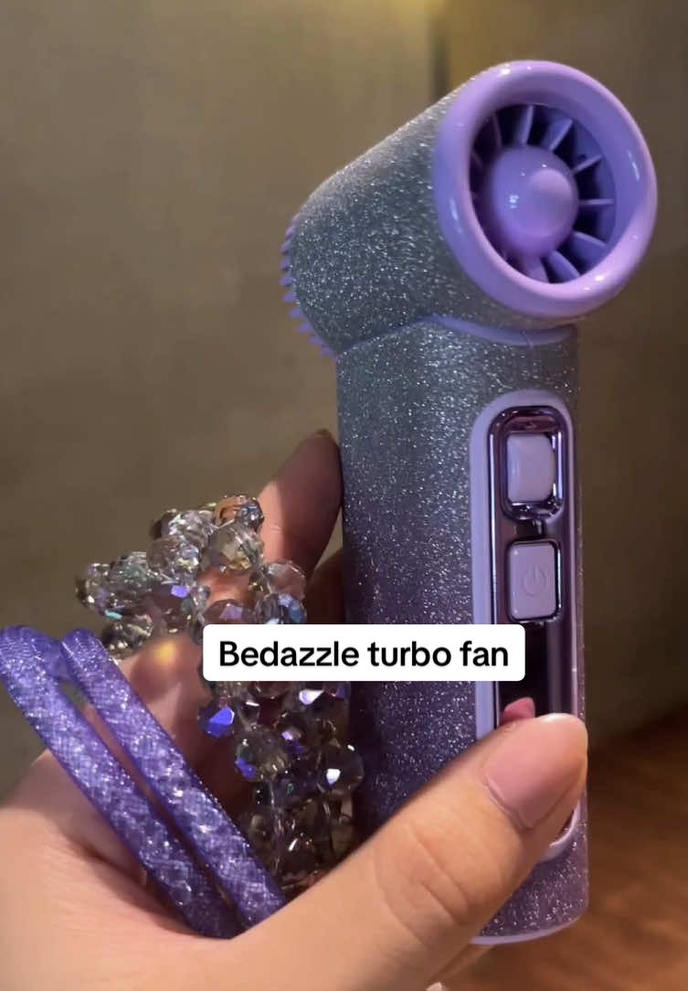 A bedazzled turbo fan!! Its so pretty! I love the bling bling and glittery design it has! It came with  its own hardcover box as well :) thank you realfit for giving a free stone chain, with lanyard. Purple looked so good with this! I gave this as a gift set to my cousin as well :) it can be a good recommendation to your friends <3 got mines here in tiktok  #turbofan #bedazzle #glitter #batteryhealth   @Realfit Official 