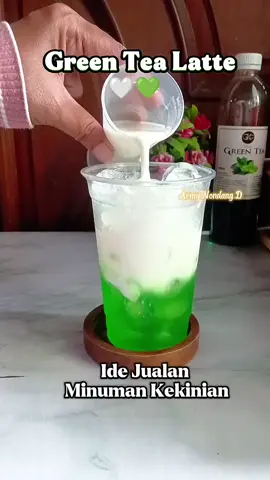 Green Tea Latte 🤍💚 Ide Jualan Minuman Kekinian. Bahan : - Sirup green tea 30ml - Air mineral 50ml - Fresh Milk/Susu UHT 100ml - Es batu secukupnya/full cup  - Cup 16 Oz  Cara membuatnya,lihat di vidio ya. Selamat mencoba. #Greentealatte  #Greenteafreshmilk  #SirupgreenteaGKC  #Idejualan #Homecafe  #Minumankekinian  #Fyp #fypage #Viral 
