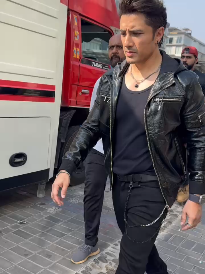 Just our hero walking in style after a shoot in this heat!! #alizafar #singer #pakistanmusic #lollywood #musician #actor