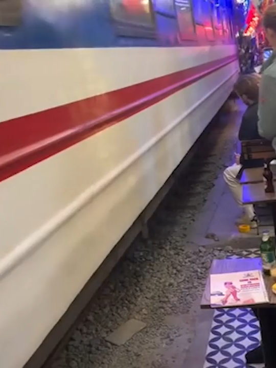 📷 A SPLIT SECOND FROM TRAGEDY – ALL FOR A VIDEO! 📷Hanoi – June 16, 2025 A foreign tourist was so focused on filming a video near the railway tracks that he didn’t notice the train speeding toward him. In just a split second, he slipped and fell — with the train only inches away! 📷 📷 Fortunately, a few nearby people rushed in and pulled him back just in time — one second later, and it could’ve ended in disaster.