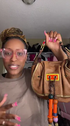 Two of my earlier thrift finds for a few years ago.  #thrifting #thrifted #thrifthaul #thrifttok #pursetok #thrifttok 