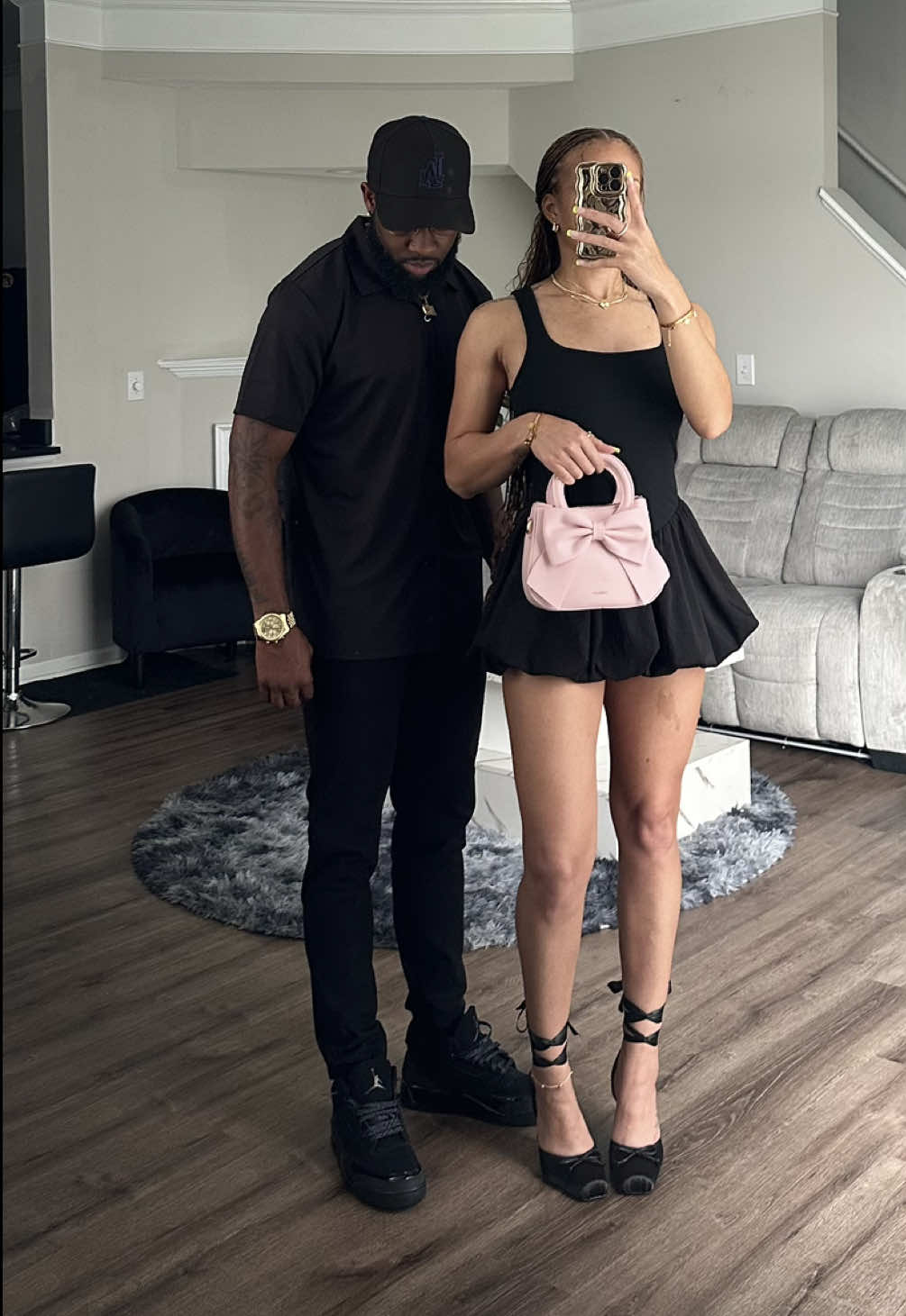The Shoes vs The Fit🥰Which one are you feeling the most?!   Tag bae🖤Link to shop the shoes and outfit in my bio under Amazon storefront🛍️ Whether you’re headed to a cute date night, dinner with friends, or just want to pop out looking put together but still playful, this all-black look with a touch of pink is it. I’m wearing my favorite lace-up ballerina heels, a flirty black mini dress, and a soft pink bow top handle bag—while he kept it classic in an all-black outfit with Jordan 4s. It’s giving his and hers fashion, Amazon outfits, and couples date night style all in one 🔥 Perfect for summer nights, birthday dinner vibes, or anytime you want to step out & turn heads effortlessly!