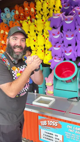 The technique here: aim for the front lip of the bucket with a soft throw and a decent arc. The trick: doing it twice in a row 😅 #tubtoss #carnivalgames #pokemon