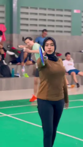 🏸