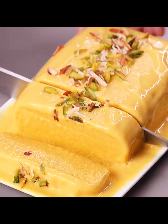 Mango ice cream without cream, condensed milk, corn flour and eggs  INGREDIENTS & PROCESS: 2 TBSP WHOLE WHEAT FLOUR FRY FOR 2 MIN. 1/4 CUP MILK MIX & KEEP ASIDE 2 CUP MILK 1/2 CUP SUGAR COOK UNTIL BOIL POUR THE WHEAT MILK MIXTURE COOK FOR 2-3 MIN. MORE POUR THE MIXTURE IN BLENDER 1 CUP FRESH MANGO CUBE BLEND FOR 2 MIN. POUR INTO A BOX KEEP IN FREEZER FOR 2 HOURS BREAK HALF FREEZING ICE CREAM POUR INTO A BLENDER BLEND FOR 1 MIN. (10 SEC. PULSE) THE MIXTURE WILL BECOME CREAMY POUR INTO THE BOX AGAIN KEEP IN FREZZER FOR 6 HOURS OR OVERNIGHT REMOVE FROM THE MOULD CHOPPED ALMOND & PISTACHIO ON TOP CUT IN SLICES . . . #foryoupage #fyp #trending #mangoicecream #summerdessert #viral #tiktokfood