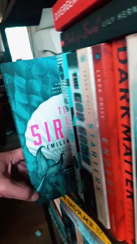 📚 Book Review 📚 Magic, Mystery & Missing Men! The Sirens by #EmiliaHart  Trade Paperback 366 pages #Adult #Historical #Fantasy #MagicalRealism  @Jonathan Ball Publishers  If Weyward was a wave that crashed over me in the best possible way, The Sirens felt more like wading through shallow water—occasional glimmers of beauty and brilliance, but also a sense that something was just out of reach.
 
 Emilia Hart weaves a tale across two timelines: the present-day Lucy, who wakes up mid-strangle on her ex (I mean, that’ll ruin a reunion), and the 1800s sisters, Mary and Eliza, who are shipped off to Australia under devastating circumstances. Dual timelines can be tricky, but here they’re one of the novel’s strongest elements. The historical chapters sang with atmosphere, and I genuinely felt the salt air and shackles, the despair and sisterly strength. There’s also some wonderfully eerie world-building—the abandoned baby in the sea cave, the whispered voices on the waves. “The sea is full of stories. It remembers everything. And sometimes, if you listen, it speaks.” That line stayed with me—it’s a perfect reflection of the tone Hart evokes.
 
 But—and here’s where I felt the tide recede—I struggled to fully connect with the story until a major twist around halfway in. Things finally clicked then, and I found myself more engaged, more curious. Still, the journey to get there was a little slow-going. And even once I reached the end, I found myself left with more questions than closure. The threads are mystical, yes, but some felt a bit too frayed to be satisfying.
 
 What The Sirens does do well is celebrate the raw, often painful, power of womanhood. Rage, resilience, generational trauma—Hart doesn’t shy away from those undercurrents. There’s a fire running beneath the waves. As one character reflects: “They had taken everything from us. But they could not take the fire in our blood.”
 
 While The Sirens absolutely explores important themes—female rage, inherited trauma, sisterhood as salvation—I couldn’t help but compare it to Weyward, which gripped me from the first page and never let go. This one had moments of brilliance, but overall, it didn’t quite cast the same spell.
 
 Still, if you enjoy feminist historical fiction with a dash of magic and a moody coastal setting, you’ll find something to appreciate here. Just know that these waters are a little murky—and not every siren’s song will lead you where you expect. 🌟🌟🌟 #BookTok #BookTokSA #TikTokSA #Books #Bookish #BookLover #BookPorn #BookCommunity #AmReading #Bibliophile #Tsundoku #Reader #ReadersOfTikTok #ReaderTok #DogDad #MrPinkInk #MrPinkInkReads 