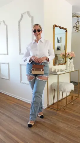 A crisp white shirt & jeans, especially when the denim sparkles is an outfit formula that never fails. Add classic accessories & you’ve got a look that works all year round. #OOTD #WardrobeFormula #EffortlessStyle #ChicAndSimple #ClassicLook #SparkleAndDenim #StyleInspo #AllYearStyle #EverydayChic #WhiteShirtOutfit #ClosetStaples #classystyle 