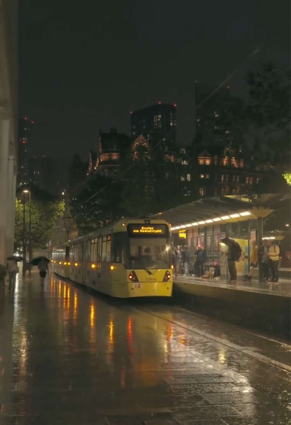 Rain, trams, and the city lights  #manchester #city #rain #asthetic #fyp #night #fypagee #citynight #rainyday #mcr 