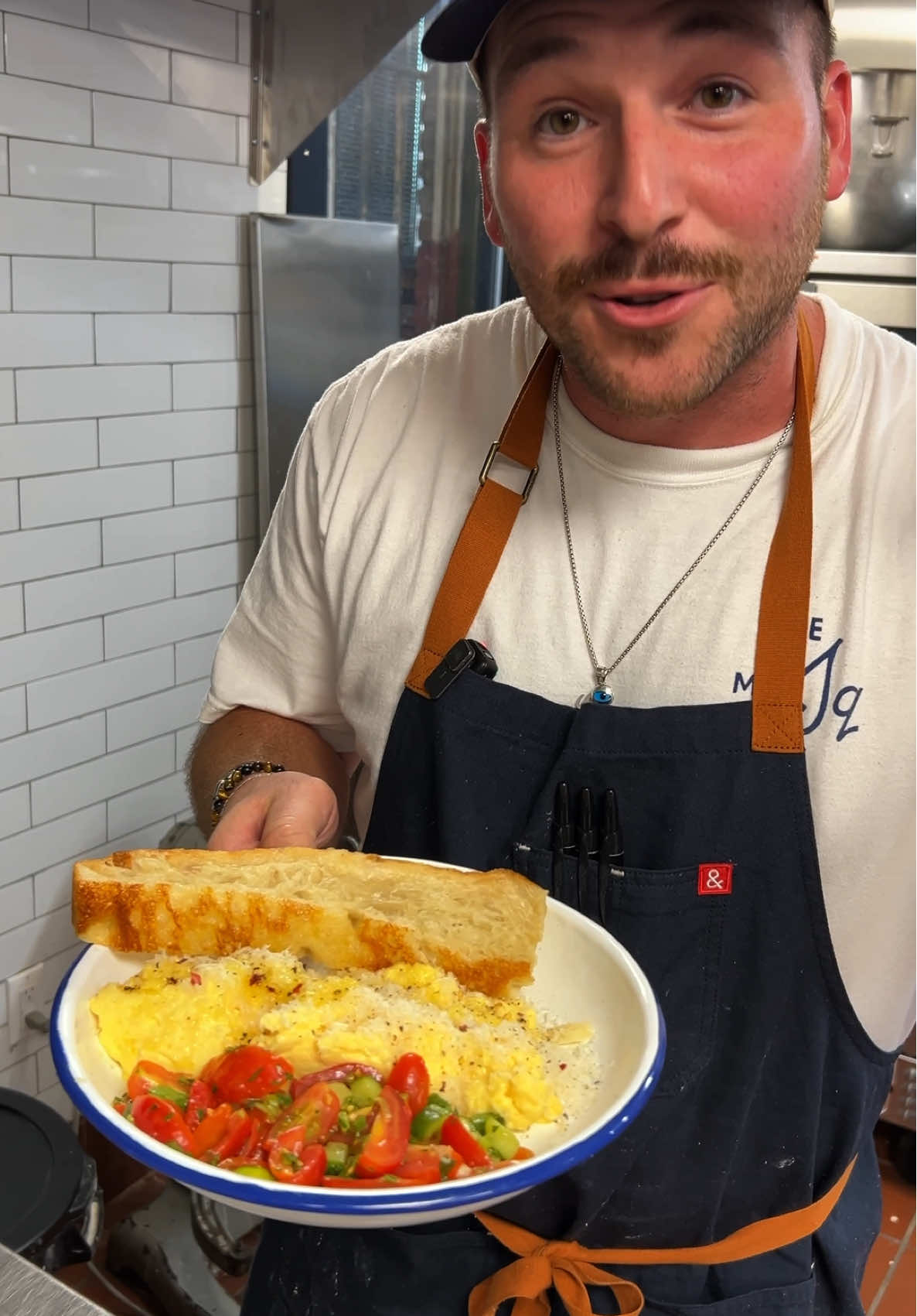 MSC Breakfast: Ricotta Scrambled Eggs, 18-Month Shaved Parm, Herbed Tomato-Cucumber Salad, and a Slice of Sourdough Foccacia 👨‍🍳 @Steve El 