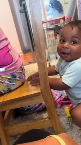 Baby playing piano for her brother 