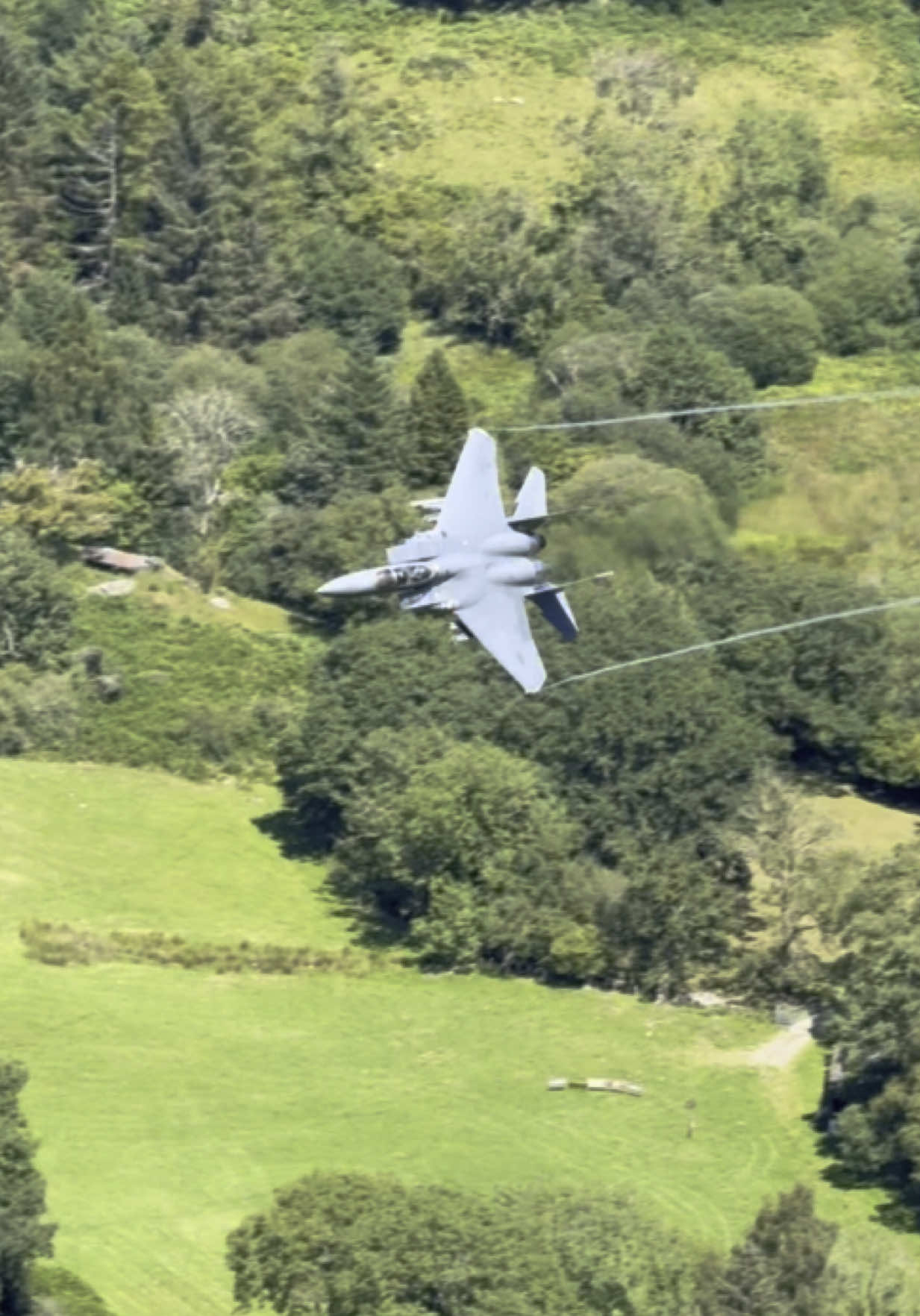 USAF 🇺🇸 F-15E strike Eagle Fighter Jets . Animal flight low level past Bluebell in the Mach loop, LFA7 10/07/25. No music on this one. . .  . . . #f15 #strikeeagle #f15eagle #fighterjetfriday #fighterjet #militaryaviationphotography #military #usaf #lakenheath #machloop #lfa7 #lowflying #aviation #avgeek #jet 