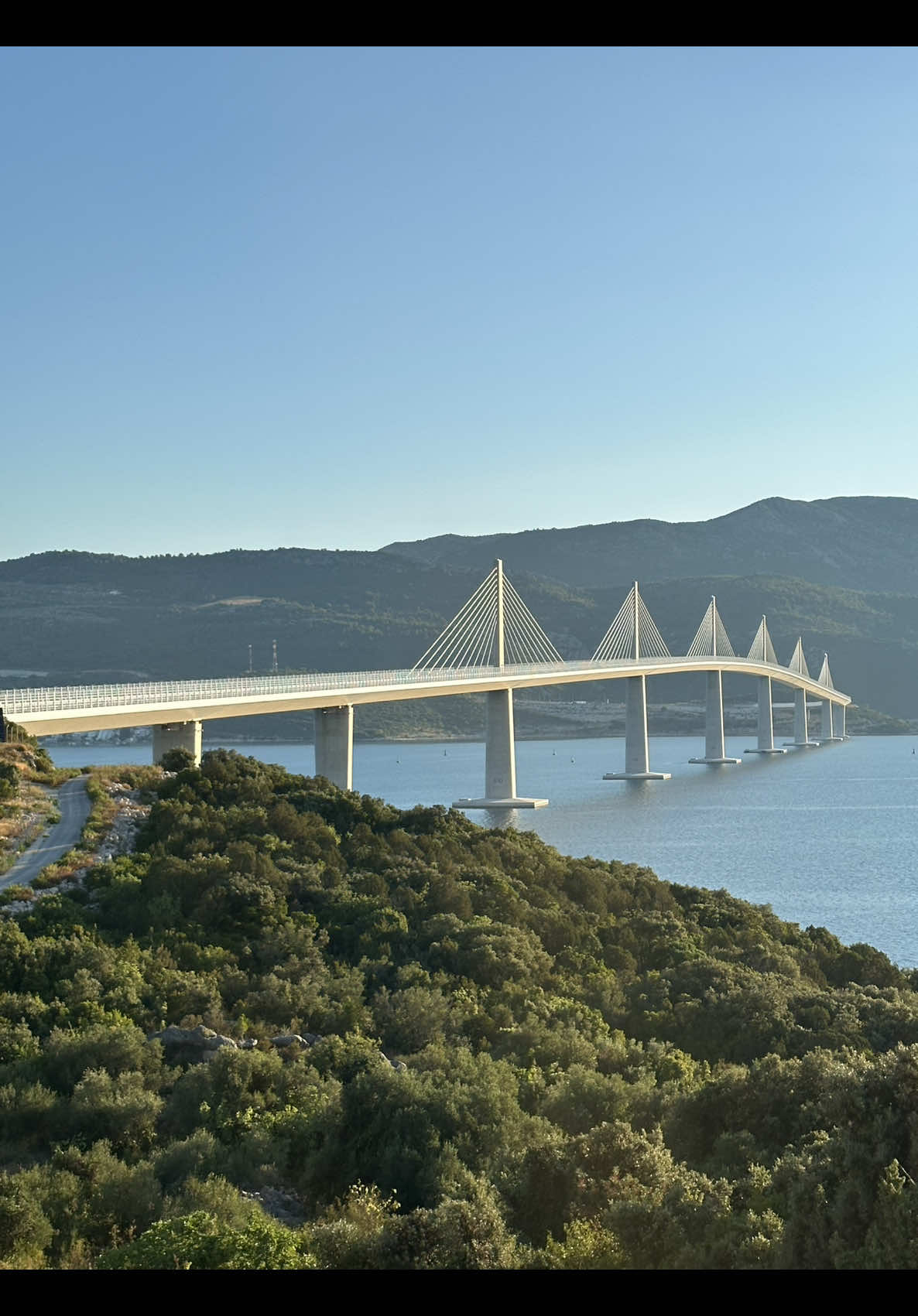 Crossing the iconic Pelješac Bridge 🇭🇷✨ Engineering meets Adriatic beauty 🌉 #Croatia #PeljesacBridge #travelvibes #architecturelovers #roadtrip