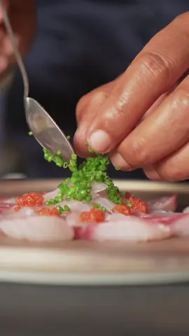Precision in every slice.  Our Houbou Usuzukuri with Ponzu Sauce is all about technique – from filleting to plating. The chef skillfully slices the vibrant Houbou into delicate, translucent sashimi, arranging each piece like a fan. Its topped with momiji oroshi, wakebi, and ponzu sauce – refreshing, sharp, balanced. Every motion tells a story. #fromtoyosutoyourtable  #bestomakasejakarta  #bestteppanyakijakarta  #japanesefoodjakarta  #fyp #viral 