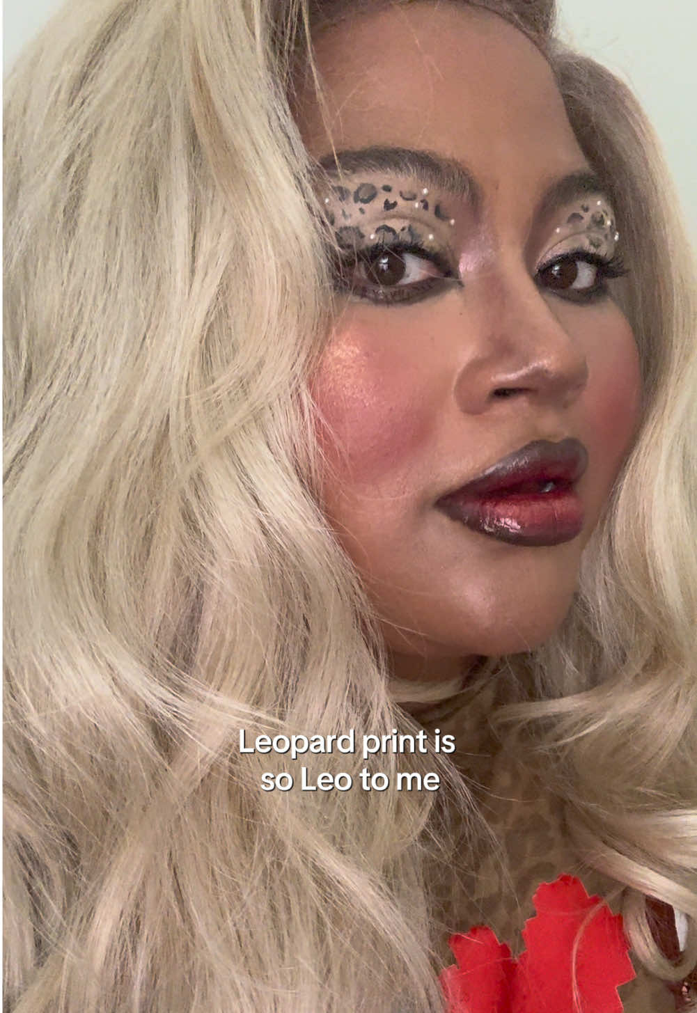 Every day I’m just playing in makeup. This leopard print look was so important to me as I’m preparing for one of my favorite times of the year. I have never had a bad August. August always shows me so much love. Leo season starts in t minus 4 days. 4 is also such a great number iykyk 🤭 My husband couldn’t stop cheesing every time he looked at me. I have done leopard nails, leopard walls, leopard cups but I guess I’ve never done leopard eyes 😮‍💨 I want to do more prints now!  I am happy I posted this. I created it on live and I realized that I love creating but not so much the act of creating to post. I love learning with you. This look I tried a brighter under eye and doubled my concealer. Next time I want to blend the second color more although it did achieve the look I wanted! Every time I’m getting better and learning more. That’s why I do this.  I never create with the filter on or retouch my makeup content because I want girls, women, people all around the world to know skin has texture. Skin can have pimple, skin can look “weird” even with makeup. You’re gorgeous and I hope you never forget it. Comparison is the thief of joy. Look at (((YOU))) in the mirror and know you’re that girl and will forever be. I love you 💋 Makeup for black girls, leopard makeup, blonder, red lip combo, unfiltered makeup, skin with texture, black girl content creator 