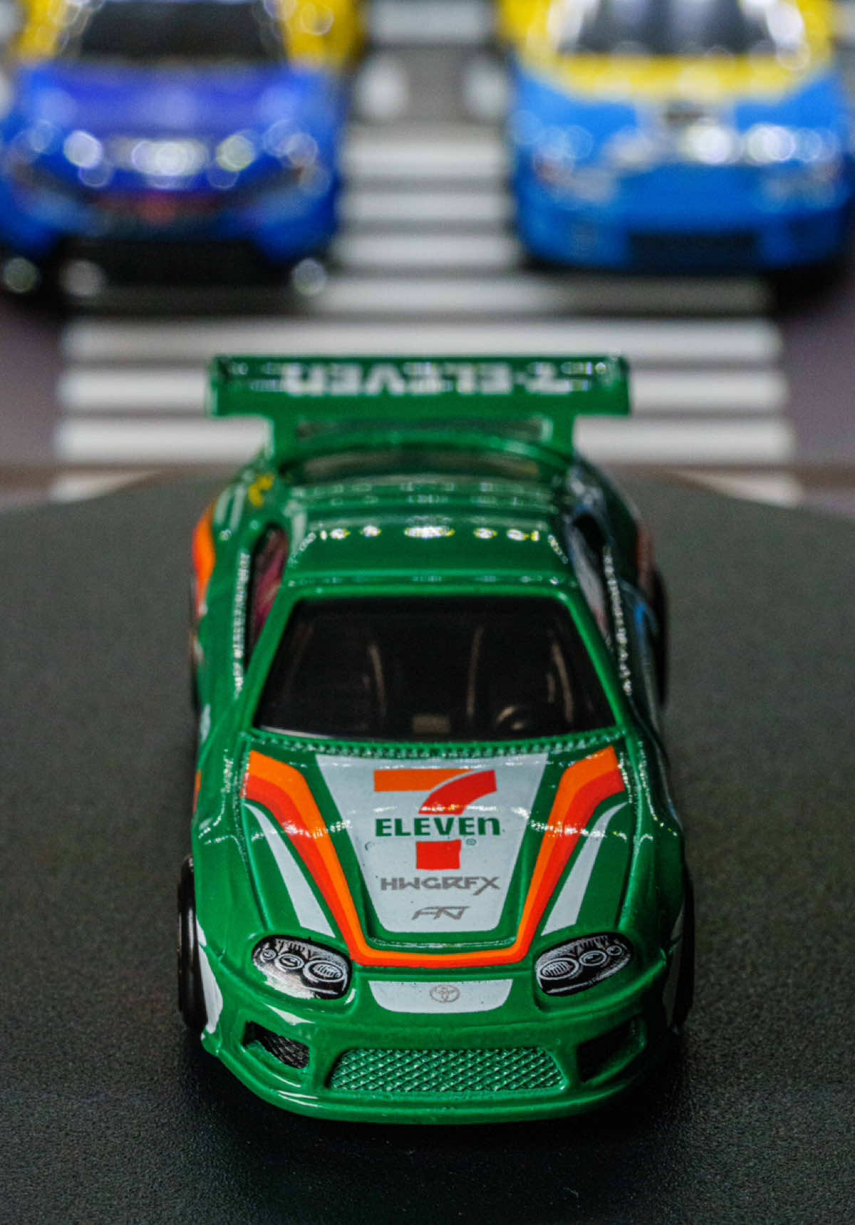 A detailed view of the 7-Elevan Hot Wheels exclusive Supra!  #7eleven #7elevansupra #7elevenhotwheels #toyota #toyotasupra #carculture #HotWheelsHunt #HotWheels #hotwheelshunting #treasurehunt #711supra  #hotwheelscommunity #hotwheelsdaily #fyp #viral #treasurehunt #hotwheels2025 