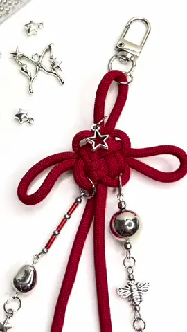 Replying to @channie's STAY at home chinese knot tutorial with aesthetic charms 🎀✨ - #chineseknottutorial #diybagcharm #silvercharms #tutorialparacord #taliparacord #aestheticbagcharm 