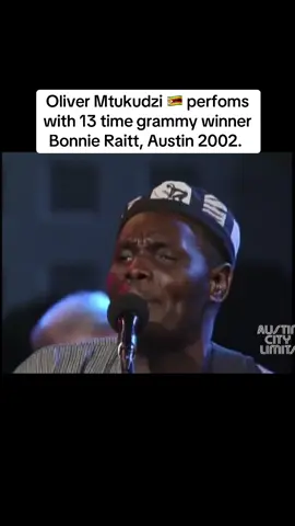 TUKU THE GREATEST OF ALL TIME {GOAT}. Ten-time Grammy Award winner and 30-time Grammy nominee Bonnie Raitt performing with her friend, the late, great Oliver Mtukudzi and Kenny Neshamba at the Austin City Limits in Texas, USA, 2002. #zimtiktokers🇿🇼🇿🇼🇿🇼 #zimtiktok #creatorsearchinsight #fyp 