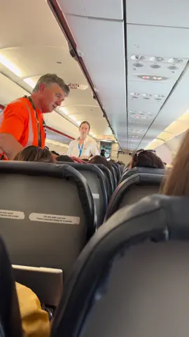 Impatient passenger being kicked off the plane. 