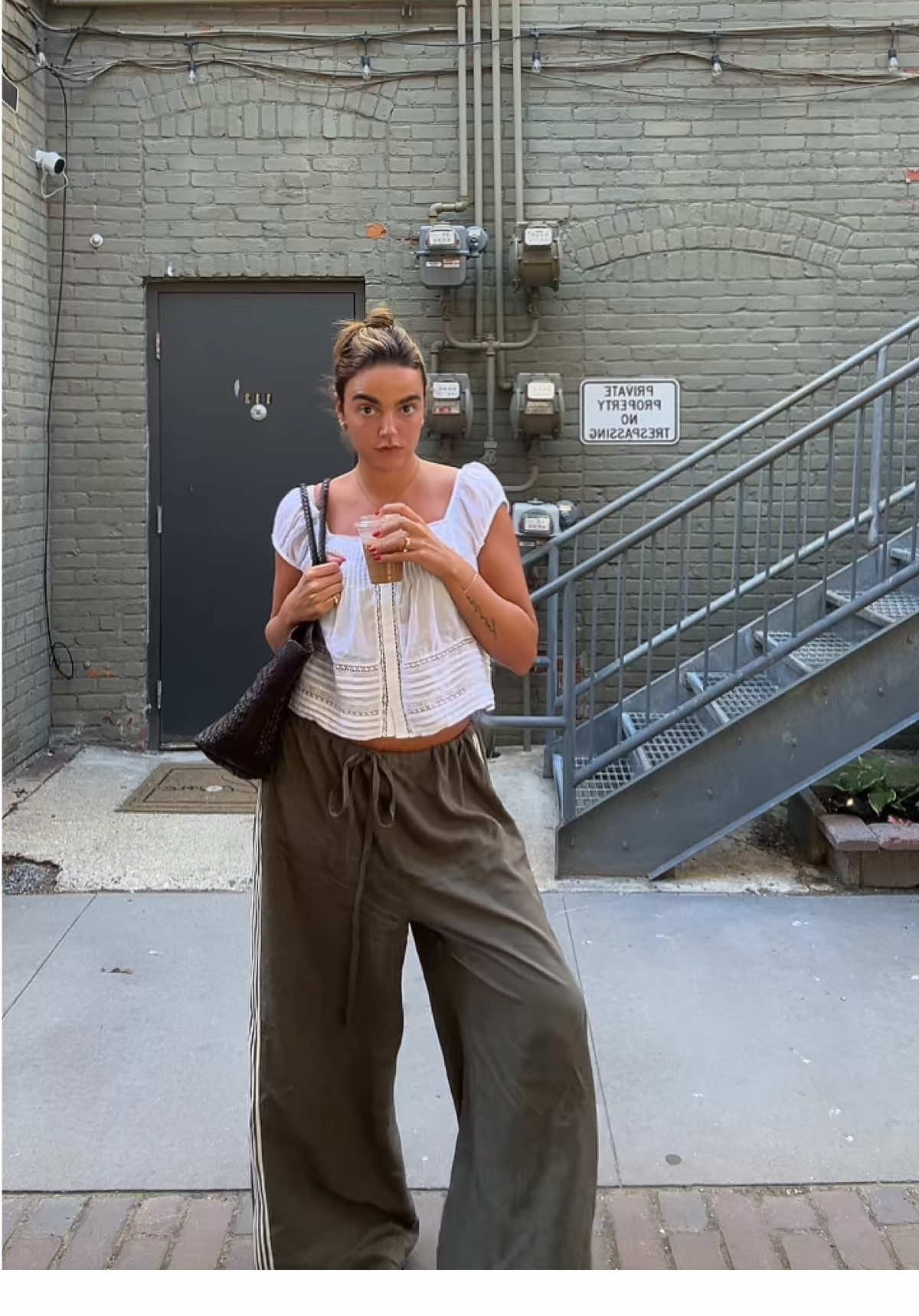 this @J.Crew babydoll top is giving Doen on a budget. I swear their new stuff is all so perfect and similar to my favorite parts of Doen. So fem & timeless.  Also I’ve been living in these @With Jéan track pants.  #jcrew #doen #withjean #pinterestaesthetic #OOTD 