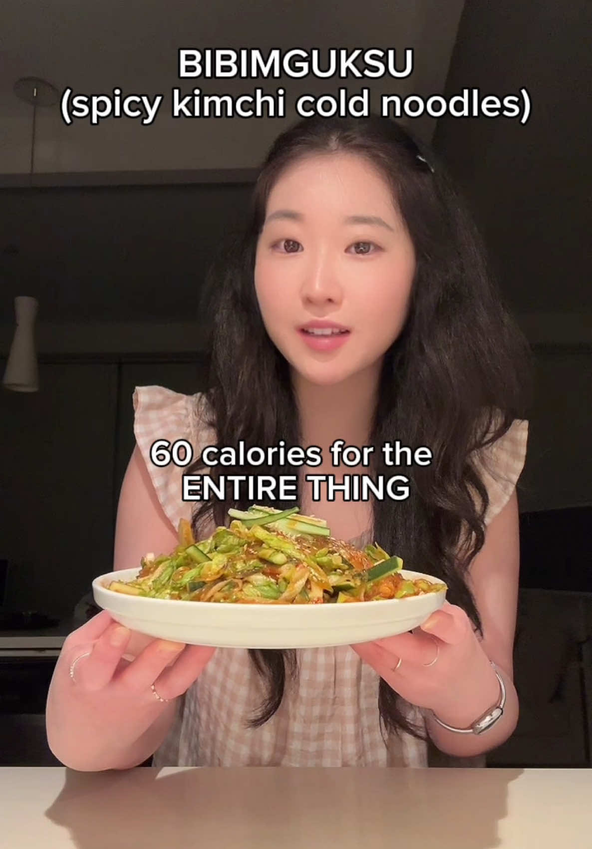 60 calorie bibimguksu (spicy kimchi cold noodles) • one of my favorite low cal meals this summer 😋 also super healthy & you can add whatever veges & protein you’d like + many of the ingredients list is optional so ifs super versatile! It took me 5 mins to make & there’s no cooking required 😼 #caloriedeficit #weightloss #lowcalorie #highvolume #diet #healthy #noodles #korean #nyc #fyp 