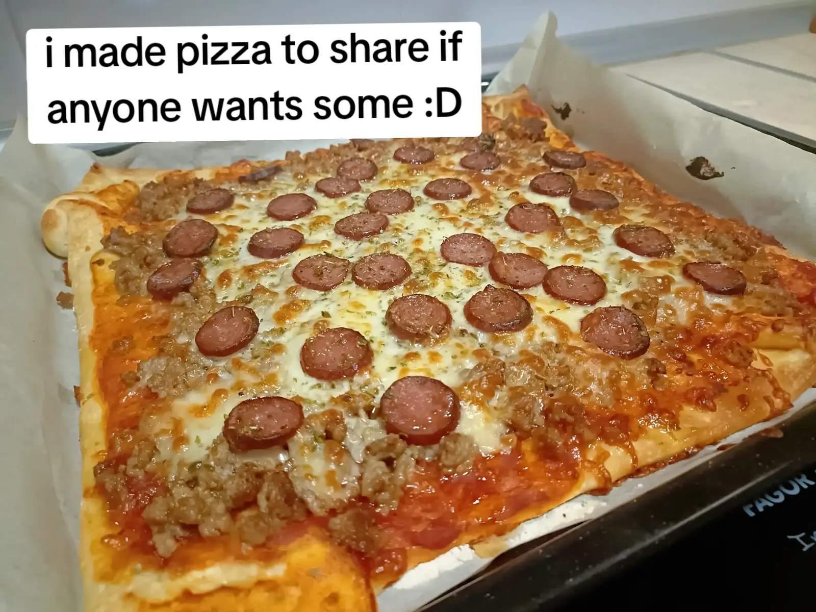 made with a pizza base (store bought unfortunately), tomato passata, minced pork meat (trust me it slaps, also pre cooked), mozzarella cheese and salami for topping!, seasoned with basic salt pepper and oregano :)  on 180 electric for 13 minutes 