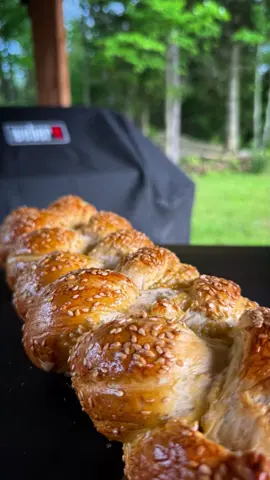 This isn’t just bread... it’s SMOKED, BRAIDED MAGIC! #Ad Turn heads (and fire up tastebuds) with this Smoked Braided Bread made on the @Weber Grills Canada Searwood™ XL 600 Pellet Grill.  The Searwood™ cooks evenly and lets you monitor and control the grill remotely for golden, fluffy, bread, packed with irresistible wood-fired flavour. Quick Recipe Recap: – Activate yeast with warm water, maple syrup & oil  - Mix with flour & salt → knead & rise (twice!)  – Braid it up  – Egg wash + sesame seeds  – Bake at 325°F on your Searwood™ for 45 min #WeberGrillsCA #PelletGrillMagic #SearwoodXL600 #BreadWithAFlame #BraidedAndSmoked
