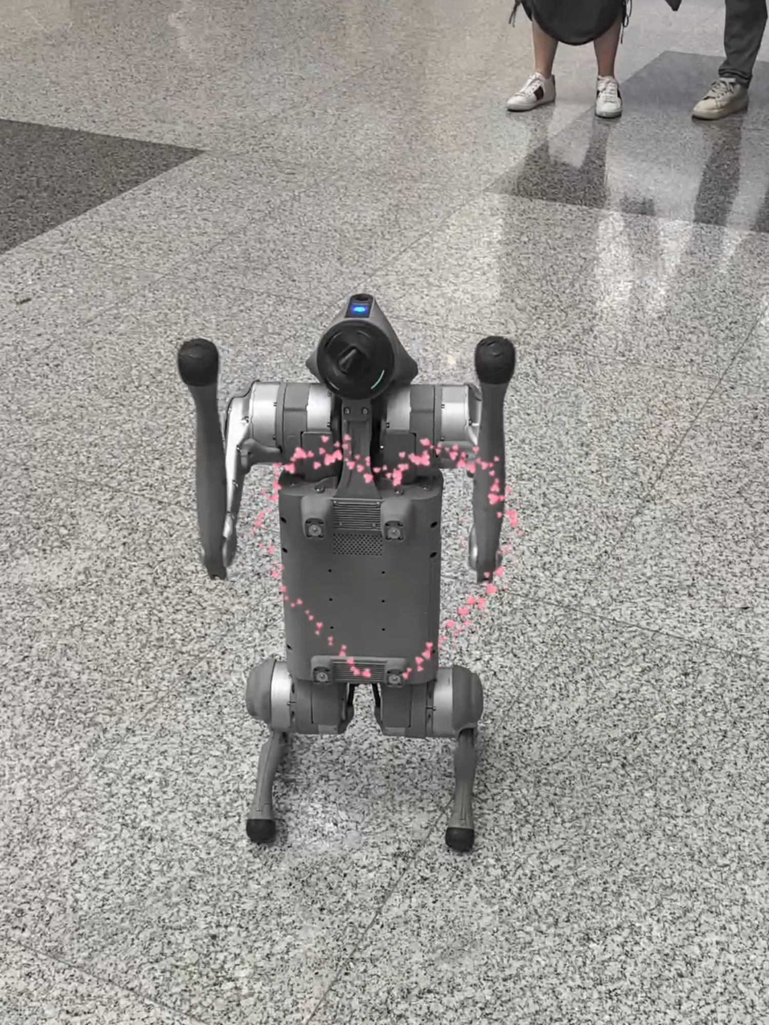A #robot puppy mastering the handshake and drawing a heart.🤖🐶💖 #WAIC2025 #Robot #AIinLife #AI #FutureTech #HumanoidRobots #AIFuture #SmartRobots