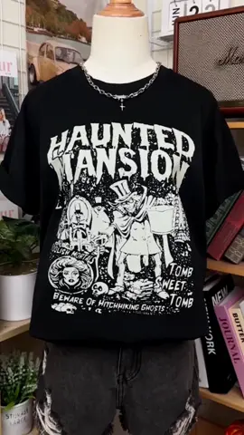 You need this shirt when visiting the Haunted Mansion 🔥💀 #halloween #halloweencostume #summerween #halloweentok #halloween2025 #hauntedmansionholiday 