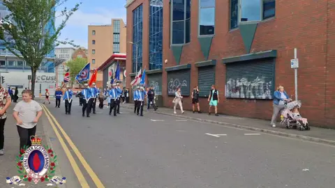 Ulster First Flute Band on parade through the Streets of South Belfast for South Belfast Young Conquerors Flute Band Annual Parade 2025