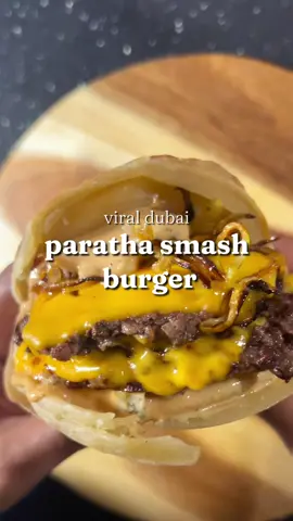 homemade food is always better! Saw these paratha smash burgers from Klay cafe in dubai and had to give them a try!  Dough  4 cups plain flour  1 tsp salt  1 tsp sugar  1.25 cups water (as needed) 2 tbsp oil  Knead well and leave for 10 mins  Smash burgers -70g of mince for each patty Burger cheese  Burger sauce  1 cup mayo  3/4 cup ketchup  1 tsp mustard  Salt and pepper  1 tsp garlic powder  1 tbsp sugar  Chopped jalapenos, pickles and onion Caramelised onion for layering  Cook parathas over a very low heat so they cook inside, about 10-15 minutes flipping halfway  Smash burger patties, add salt and pepper and cook on a high heat, about 2 mins each side  Enjoy!! #smashburger #smashburgerrecipe #jalapenos #burgersauce #easydinners #viralrecipe #dubaifood #DinnerIdeas 